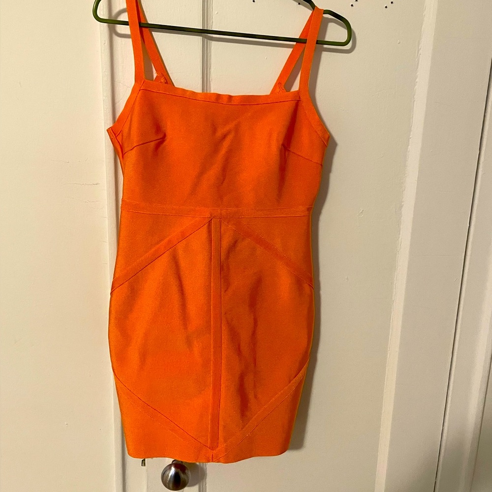 Bright Orange mini dress fits like a small, great for curvy girls